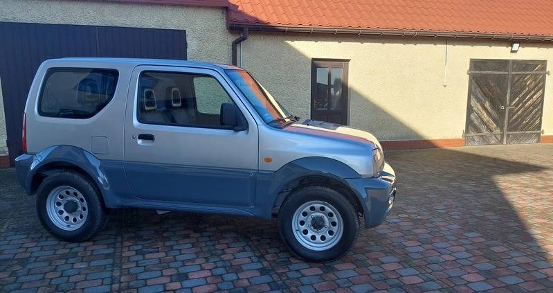 Suzuki Jimny cena 35700 przebieg: 155460, rok produkcji 2011 z Nidzica małe 211